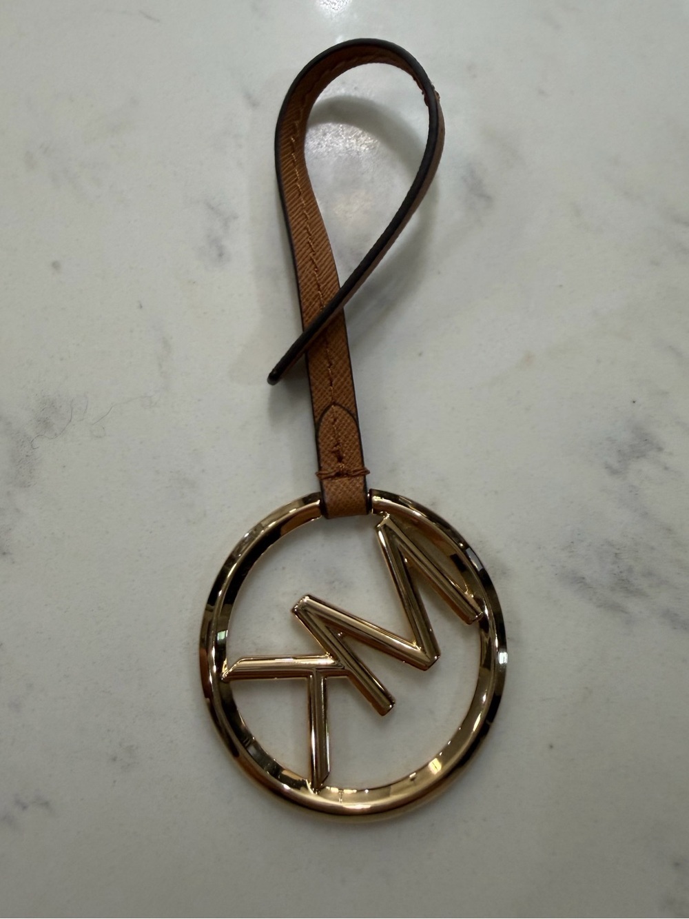 Michael Kors Gold-Tone TM Circle Charm with Tan Strap